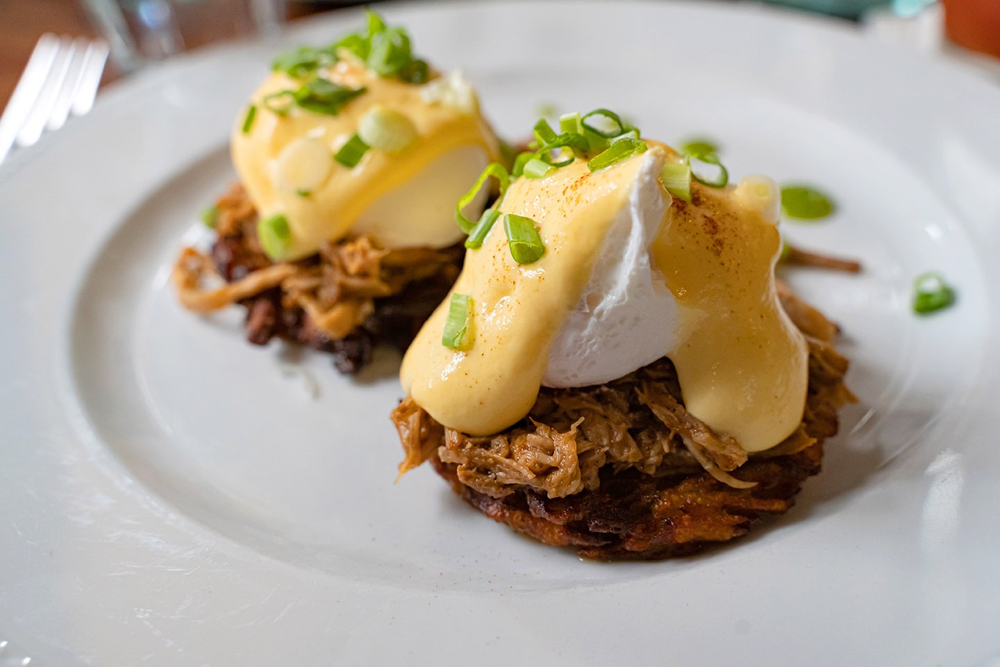 Pulled,Pork,Served,On,Fried,Potato,Pancakes,Topped,With,Poached Pulled pork